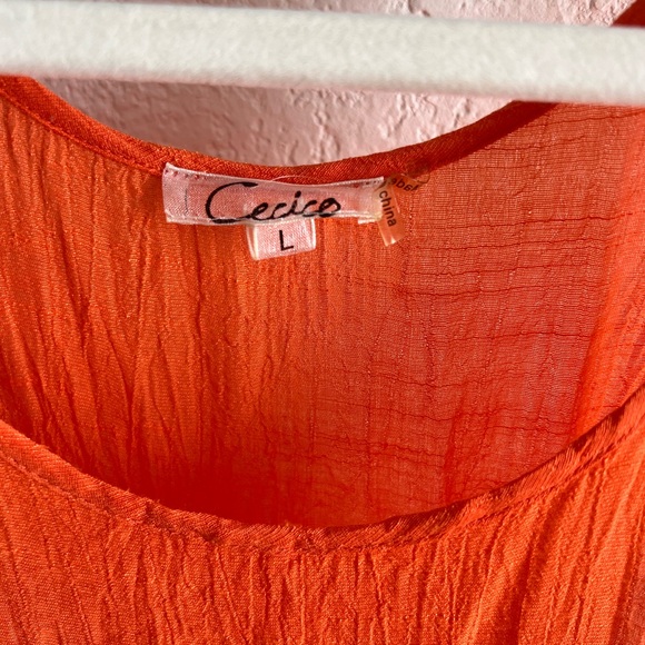 Beautiful orange boutique dress, short front cascading to long ruffling in back - Picture 5 of 5